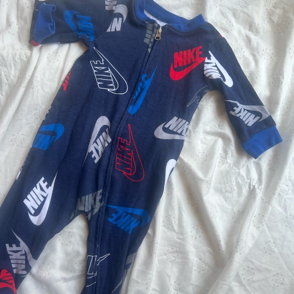 Nike Blue and Red Footies with Swoosh Design